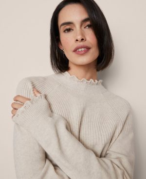 Ruffle Trimmed Mock Neck Sweater